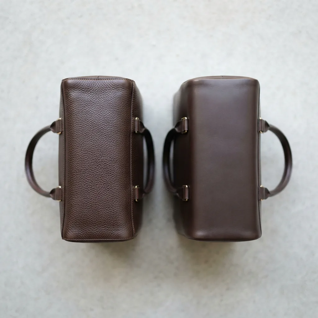 Close-up comparison of pebbled and smooth leather handbag textures side by side.